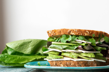 Sticker - Vegetarian sandwich with avocado and microgreen. Healthy food.