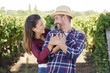 © auremar - portrait of smiling couple hugging at vineyard during sunny day
