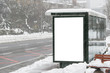 Billboard on street in winter