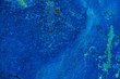 A background made of blue azurite that is heavily weathered with lots of texture.