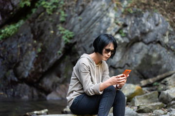 Poster - Asian woman using mobile phone