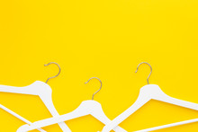 White Hangers Background For Sale Shopping Concept