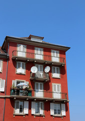 Wall Mural - red historical apartment building in Strasbourg - France