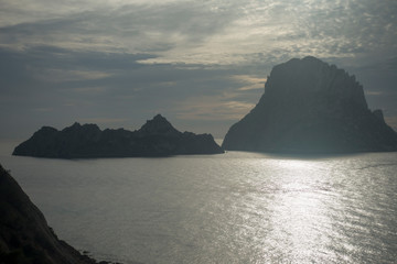 Wall Mural - A beautiful sunset on the island of Es Vedra, Ibiza