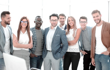 group of successful business people standing in the office