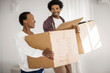 © Erickson Stock - Happy couple moving into their new home.