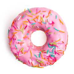 Flat lay pink donut decorated with colorful sprinkles isolated on white background. Sweet donut on white. Top view