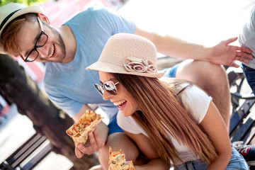 Canvas Print - Happy couple eating pizza