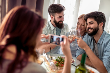 Canvas Print - Friends having lunch together at home