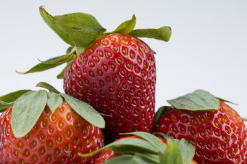 Macro photo of ripe red strawberries.