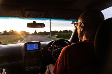 man driving in the countryside