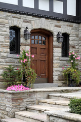 Poster - Tudor style house with stone facing and flagstone steps