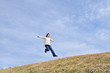 © hanapon1002 - Japanese girl jumping in the blue sky