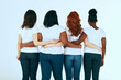 © alfa27 - Rear view of diverse multi ethnic women with different body size and hairstyle standing in row dressed in the same casual manner, hugging together on white background.