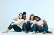 © alfa27 - University students posing in studio in skinny jeans and white t-shitrs. All women are natural and different in their common beauty, having diverse skin, hairstyle and body weight, happy in youth