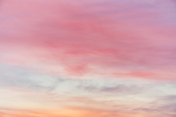 Wall Mural - sunset sky with pink yellow light clouds. colorful smooth blue sky gradient. natural background of s