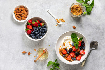 Wall Mural - Yogurt with fresh berries and granola