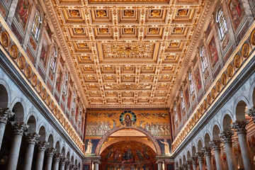 Rome, roof decorations detail and Triumphal arch, or arch of Galla Placidia. The Papal Basilica of St. Paul outside the walls