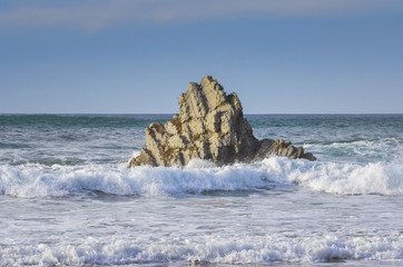 Wave breaking on the rock