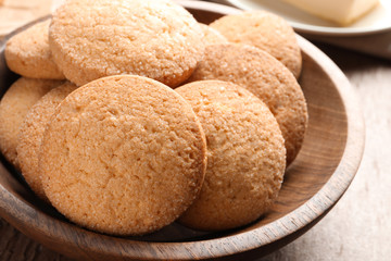 Bowl with Danish butter cookies on table, closeup