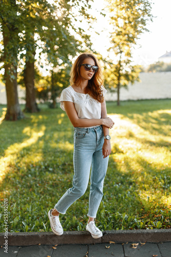 modern stylish girl in jeans top