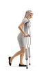 © Ljupco Smokovski - Young woman walking with crutches