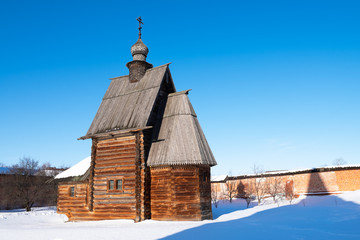 Wall Mural - View of the russian wooden church in winter