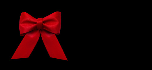 Red Ribbon Present Decoration Isolated on Black Background