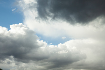 Dark clouds interspersed with white clouds