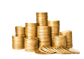 Stacks of shiny coins on white background