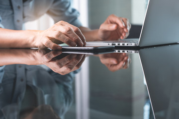 Working on laptop computer