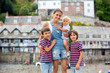 Beautiful family, walking on the streets of Clovelly, nice old village in the heart of Devonshire