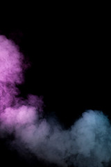 Wall Mural - Colorful smoke on black background