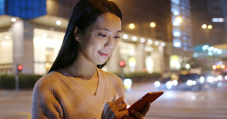 Sticker - Woman check on cellphone in the street