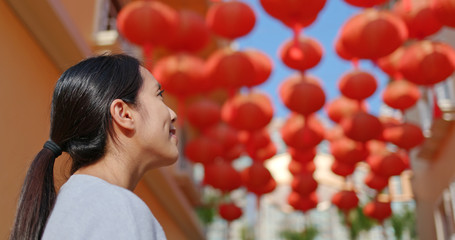 Poster - Woman enjoy look at the red lantern