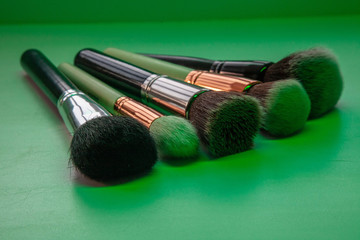 a set of professional makeup brushes