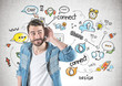 © ImageFlow - Casual young man listening, social media