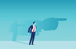 © Feodora - Vector of a businessman shadow pointing him a direction