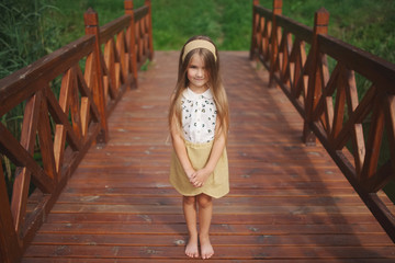 happy little girl with long hair