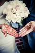 henna mehndi indian wedding with bouquet