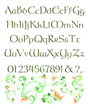 English Alphabet In Green Celtic Type And Floral Decorative Swirls. Decorative Font For Print, Banner, Card, Poster, Advertisement, Announcement, Etc.