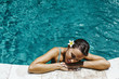 © Alena Ozerova - Woman relaxing in swimming pool