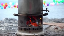 4K Zoom Out Making Tea In The Teapot On Fire At The Seaside One The Rainy Day