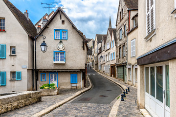 Poster - Cozy street with old houses in a small town Chartres, France