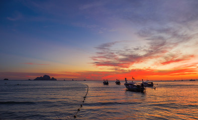 Canvas Print - Long tail boat at sunset in Thailand