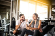 © kavee29 - Portrait Fitness coaches are controlling the training equipment,Dumbbell Triceps Extension The Triceps are powerful,beautiful young girl warming up with weights in Gym health club
