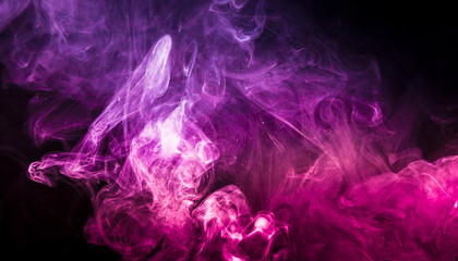 Colored smoke on black background