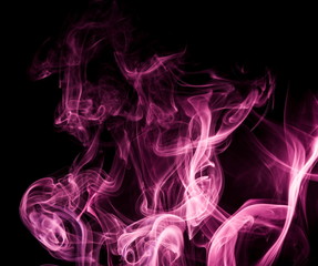 Purple smoke on black background