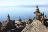 Fototapeta Big Ben - piles of rocks in Scotish Lake, Scotland