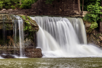 Wall Mural - Indiana’s Upper Cataract Falls - The ruins of an old mill top the rocky bank alongside Upper Cataract Falls in Owen County, Indiana.